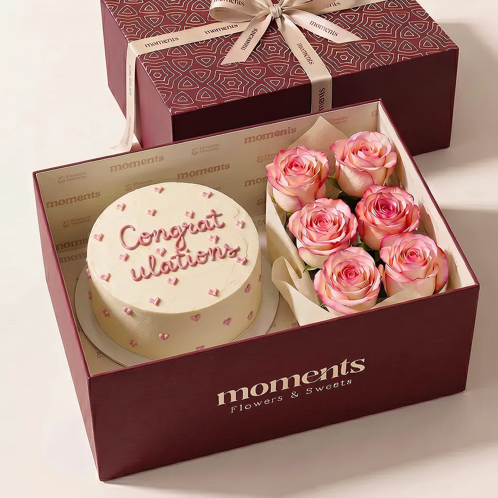 Congratulations cake with red roses in a mahogany Moments gift box
